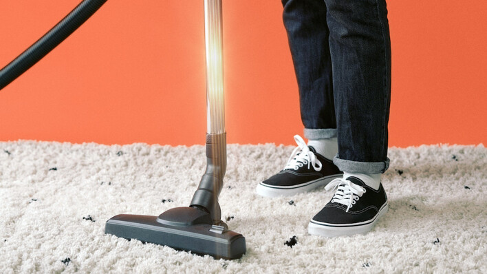 Vacuuming a carpet