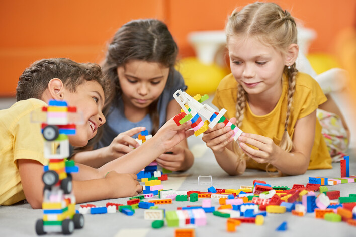 Group of children playing with Lego