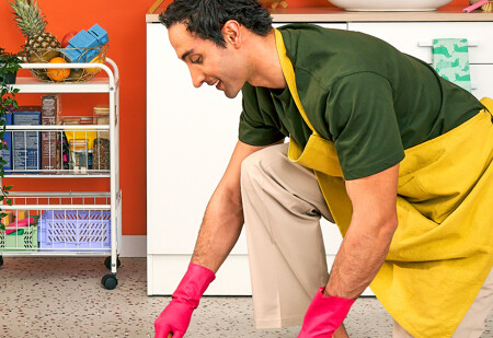A housekeeper cleaning the floor