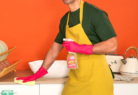 a housekeeper cleaning the kitchen