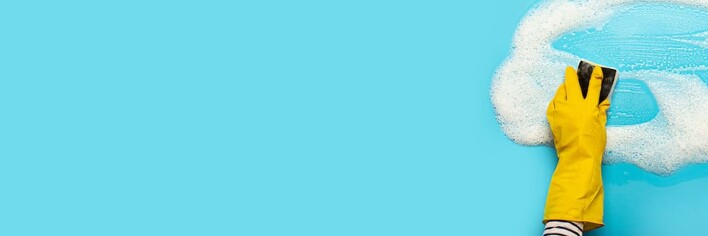 cleaning sponge on blue background