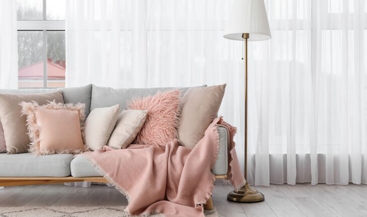 sofa with throw and cushions