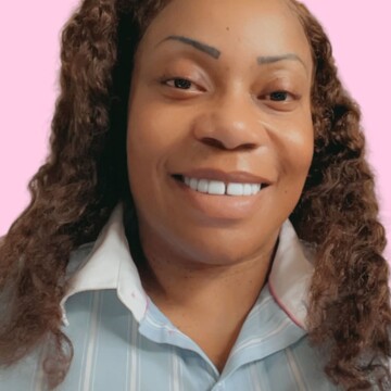 Hairdresser at home, Enfield Lock - Latoya